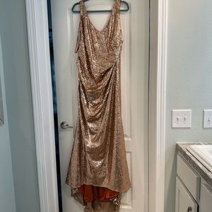 Like new. Fully lined rose-gold mermaid gown